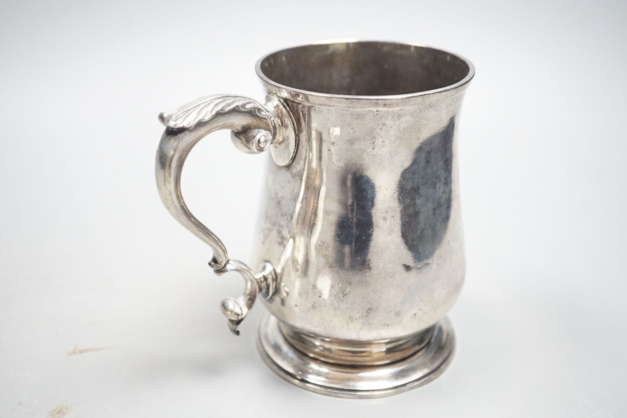 A George III silver baluster mug, Charles Wright, London, 1772, 13cm, 13.5oz.